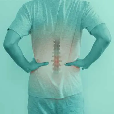 1 chiropractor adjusting lower back as part of Dr. Tim's full service chiropractic in olympia wa