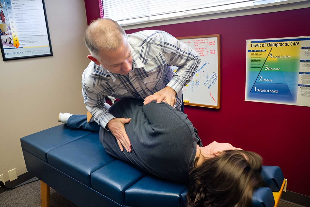 Dr. McConnell Performing a gentle chiropractic adjustment